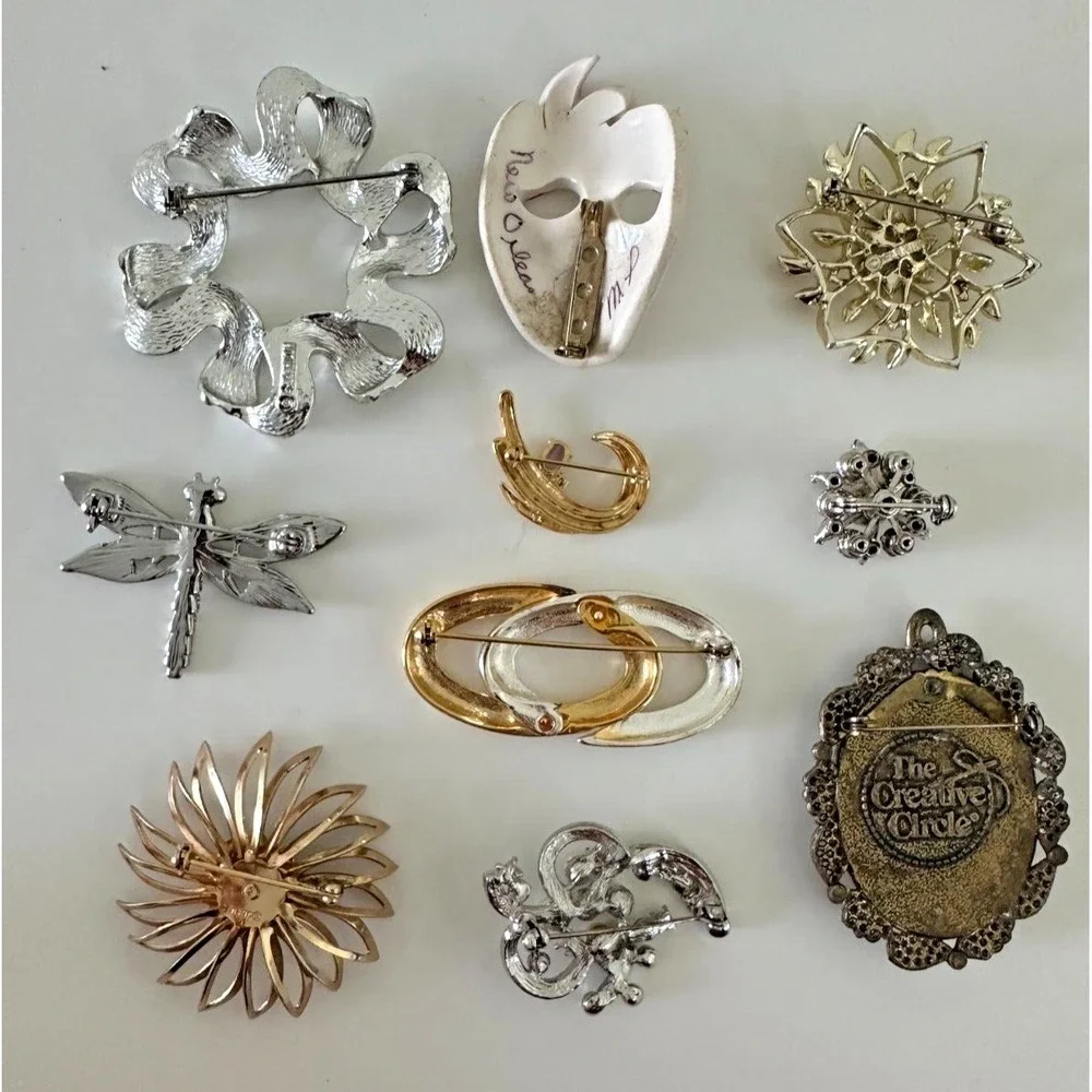 The Unbranded Brand brooch painted